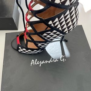 Alejandra G. Limited edition Black, Red and White. size 39 fits 8 to 9. 4 in